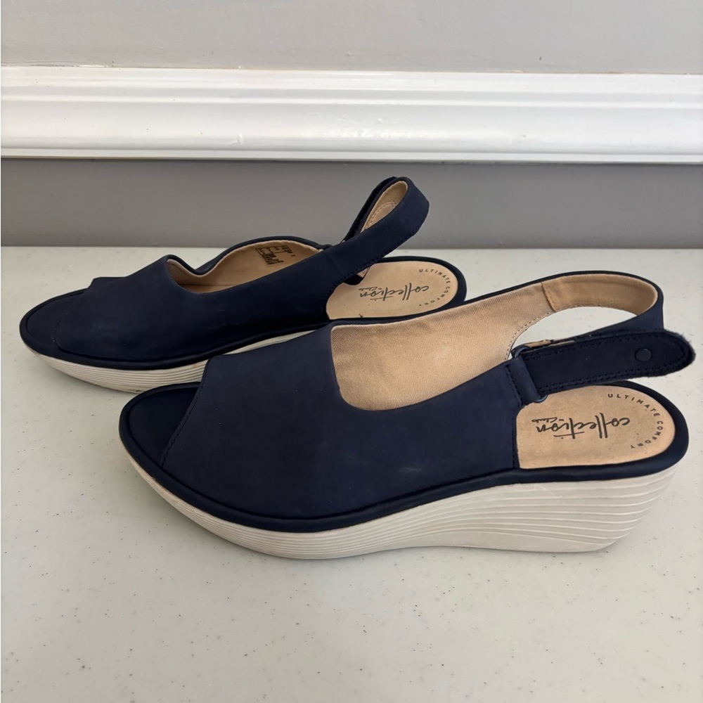 Clark’s ultimate comfort collection open toe wedge navy sling back, size 9.
